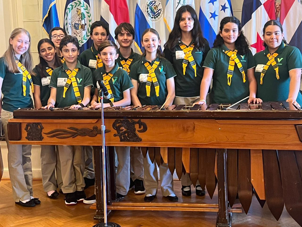 Students from the Children’s Marimba Valle Verde School with a marimba, which is a national symbol of culture in Guatemala.